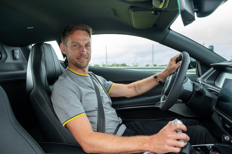 Jenson Button drives a Lotus sports car