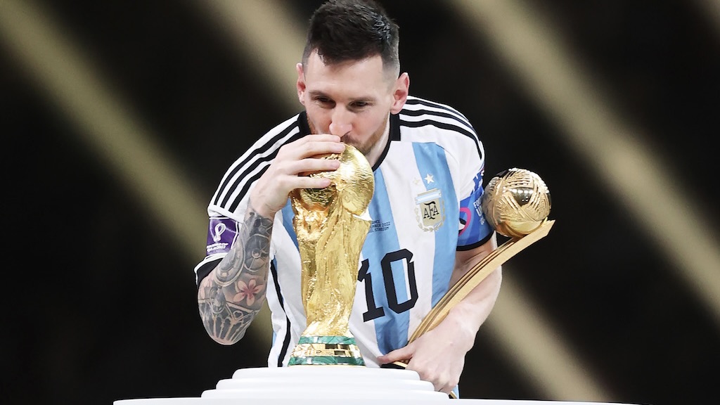 Leon Messi with FIFA trophy