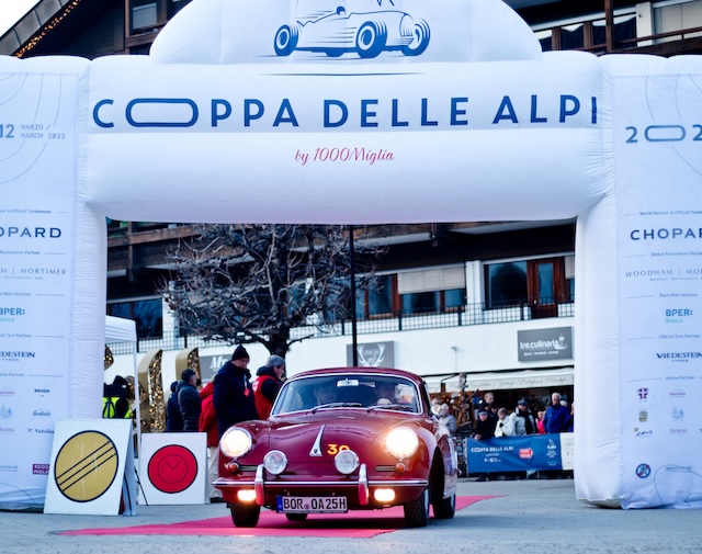 red vintage Porsche on rally.