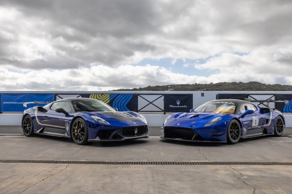 two blue Maserati sports car